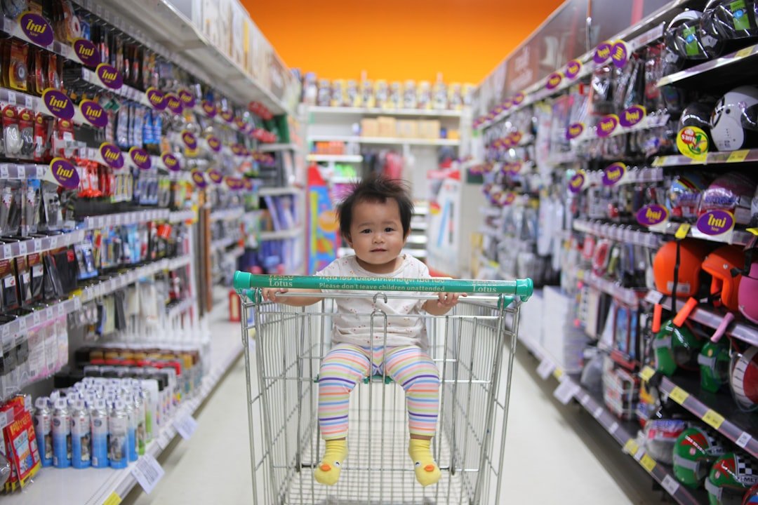 baby-on-white-shopping-cart-qaumoljwb48